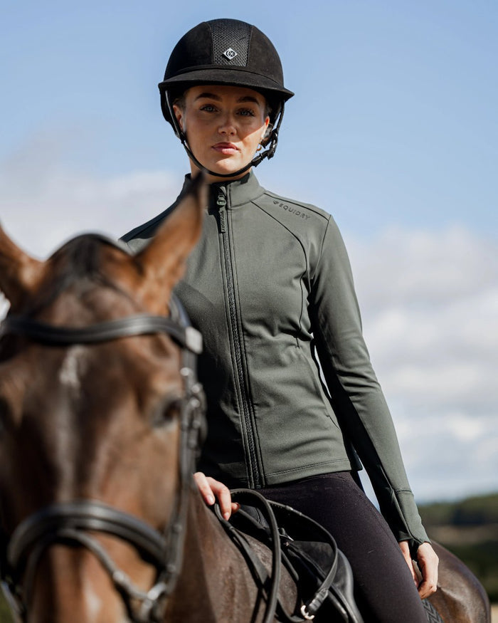 Black Forest Green Black Coloured Equidry Womens Water Repellent Zip Up Top on outdoor background #colour_black-forest-green-black