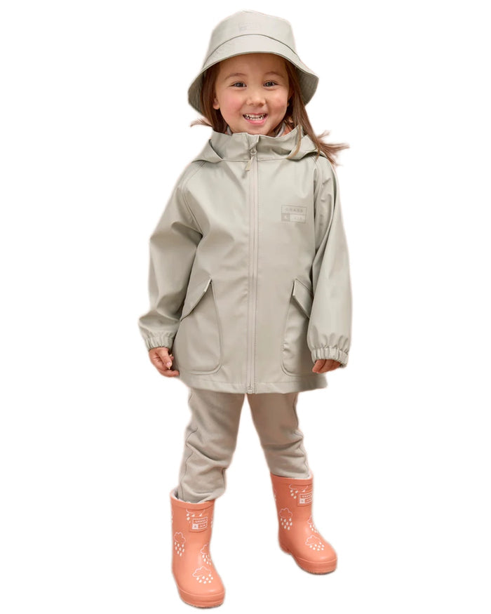 Geothermal Grey coloured Grass & Air Childrens Rainster Jacket on white background #colour_geothermal-grey