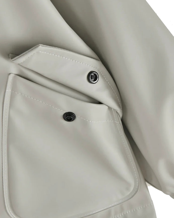 Geothermal Grey coloured Grass & Air Childrens Rainster Jacket on white background #colour_geothermal-grey
