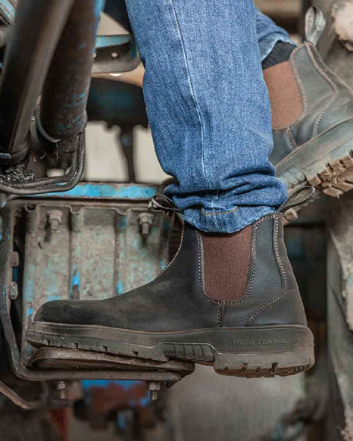 Brown Coloured Hard Yakka Outback Steel Toe Safety Dealer Boots on Outdoor Background
#colour_brown