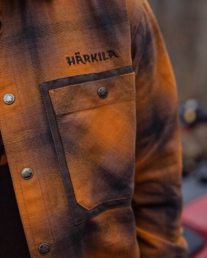 Maple Check coloured Harkila Folke Long Sleeve Shirt pocket close up #colour_maple-check