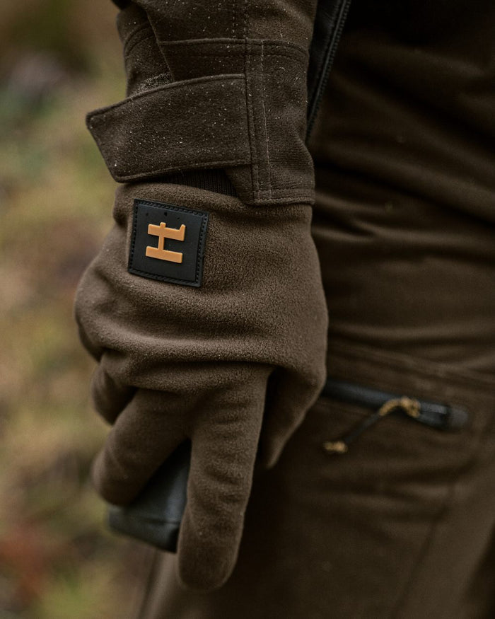 Hunting Green Shadow Brown Coloured Harkila Forest Hunter WSP Gloves on outdoor background #colour_hunting-green-shadow-brown