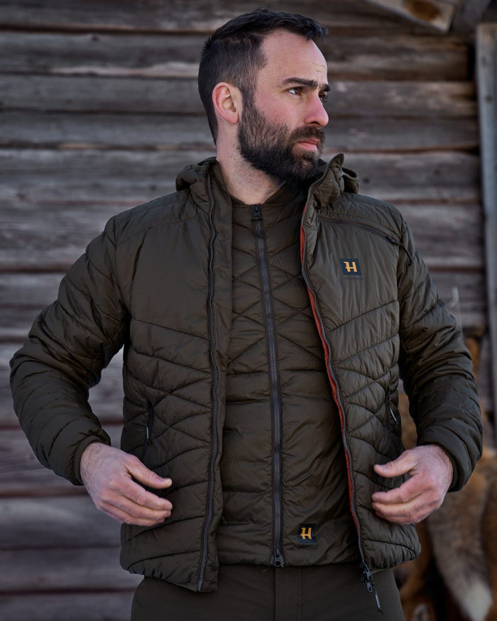 Willow Green Coloured Harkila Logmar Insulated Packable Waistcoat on white background #colour_willow-green