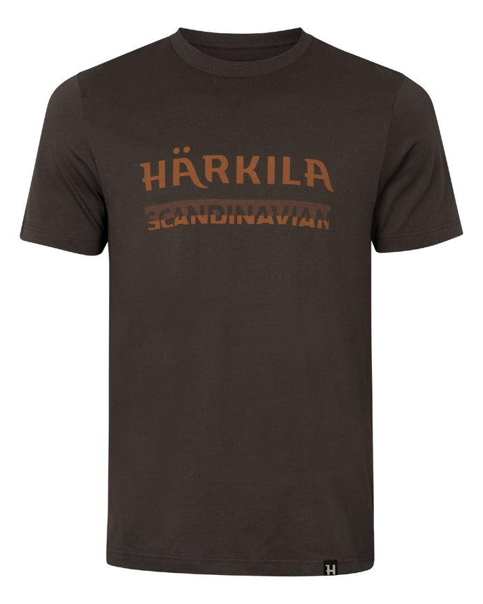 A dark brown short-sleeve crewneck t-shirt featuring a distressed graphic print on the chest that reads 'HÄRKILA SCANDINAVIAN' in a muted brownish-orange tone, shown against a plain white background. #colour_shadow-brown