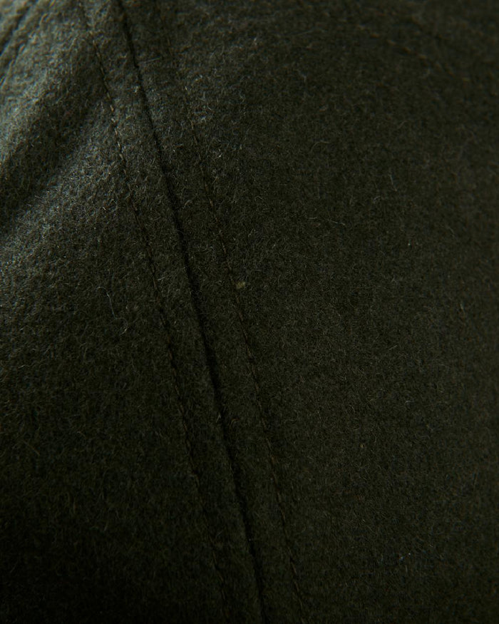 Willow Green Shadow Brown Coloured Harkila Metso Active Cap on blurry background #colour_willow-green-shadow-brown