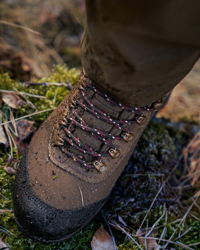 Mid Brown Coloured Harkila Wildwood 2.0 GTX Womens Waterproof Boots on outdoor background #colour_mid-brown