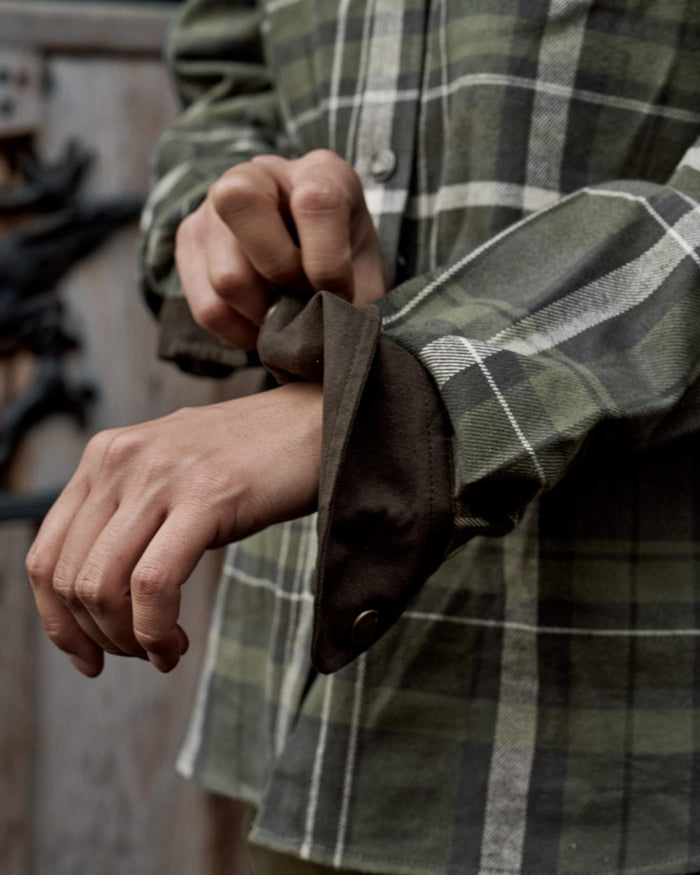 Olive Check Coloured Harkila Womens Pajala Long Sleeve Shirt on outdoor background #colour_olive-check