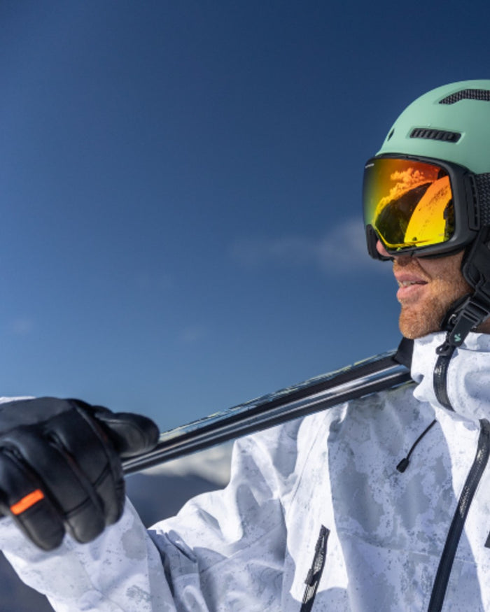 Black Coloured Helly Hansen All Mountain Gloves on snow background #colour_black