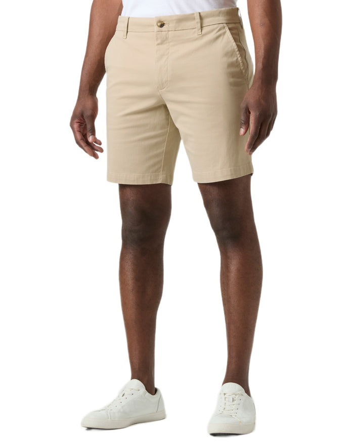 Khaki coloured Helly Hansen Mens Bryggen Chino Shorts on white background #colour_khaki