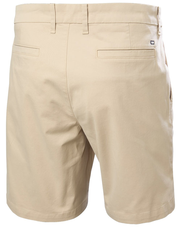 Khaki coloured Helly Hansen Mens Bryggen Chino Shorts on white background #colour_khaki