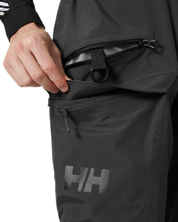 Black Coloured Helly Hansen Mens Sogn Bib Shell Pant on white background #colour_black