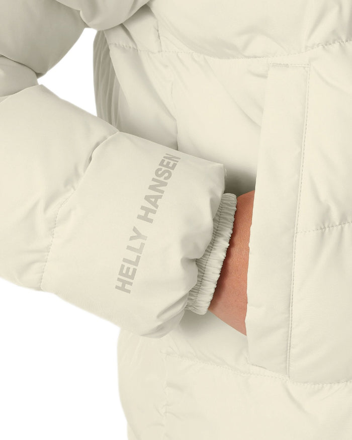 Cream Coloured Helly Hansen Womens YU 23 Reversible Puffer Jacket on white background #colour_cream