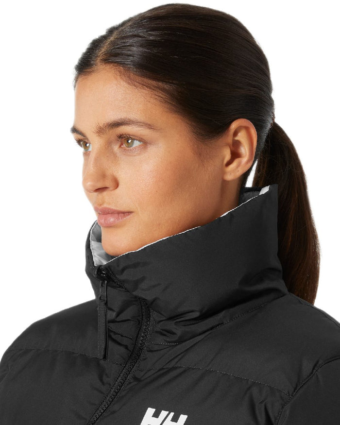 Black Coloured Helly Hansen Womens YU 23 Reversible Puffer Jacket on white background #colour_black