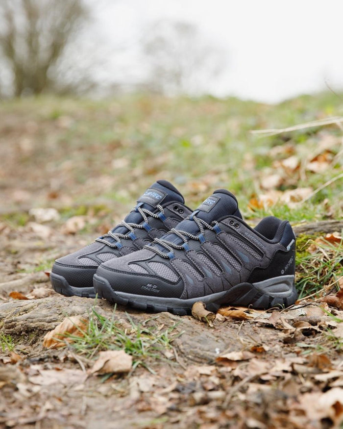 Charcoal coloured Hi-Tec Mens Corzo Low Boots on trail background #colour_charcoal