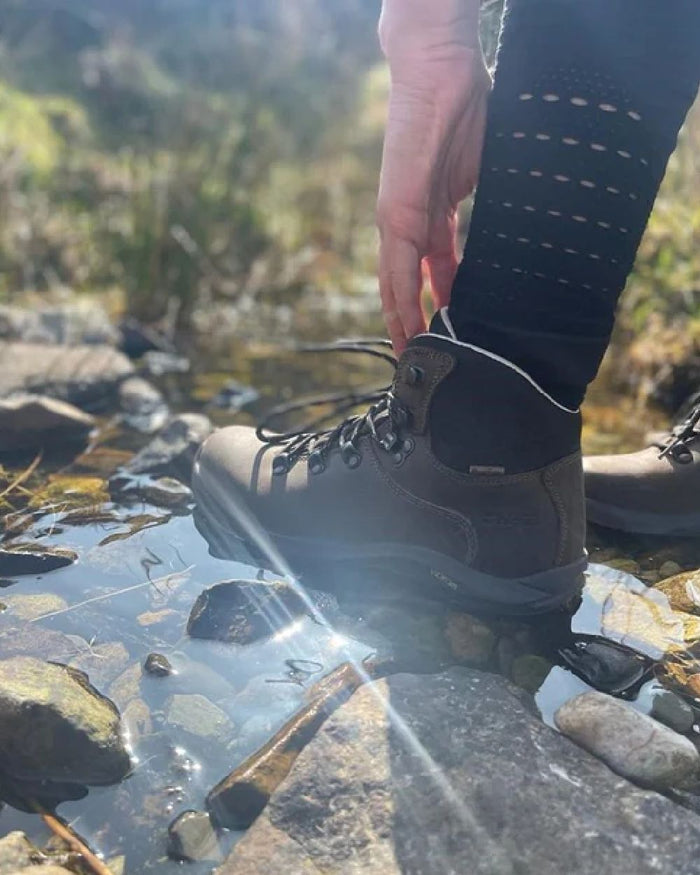 Brown Coloured Hi-Tec Womens Ravine Pro Boots on pond background #colour_brown