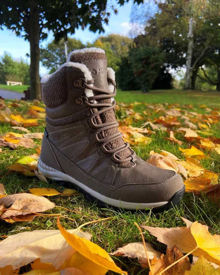 Beige Coloured Hi-Tec Womens Riva Mid Boots on ground background #colour_beige