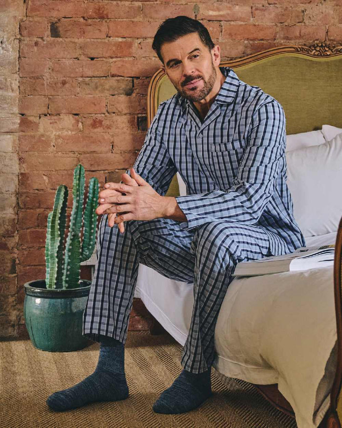 Blue Check Coloured HJ Hall Mens Pure Cotton Pyjamas on indoor background #colour_blue-check