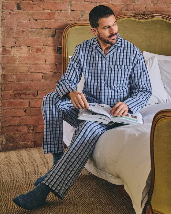 Blue Check Coloured HJ Hall Mens Pure Cotton Pyjamas on indoor background #colour_blue-check