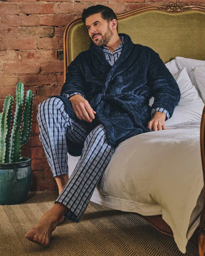 Blue Check Coloured HJ Hall Mens Pure Cotton Pyjamas on indoor background #colour_blue-check