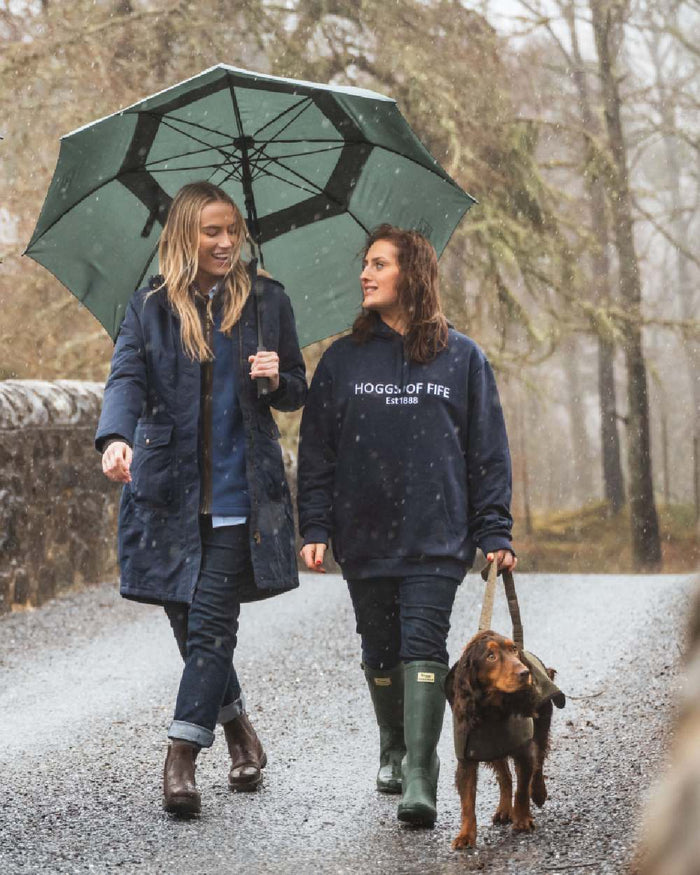 Navy Coloured Hoggs of Fife Annan 1888 Hoodie on countryside background #colour_navy