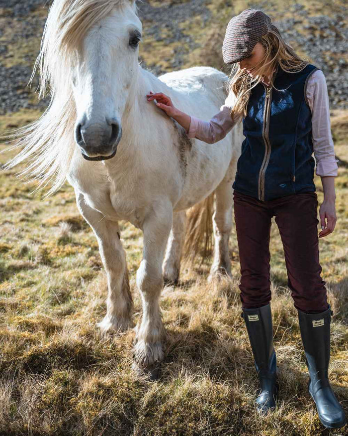 Merlot Coloured Hoggs of Fife Ceres Ladies Stretch Cord Jeans on outdoor background #colour_merlot