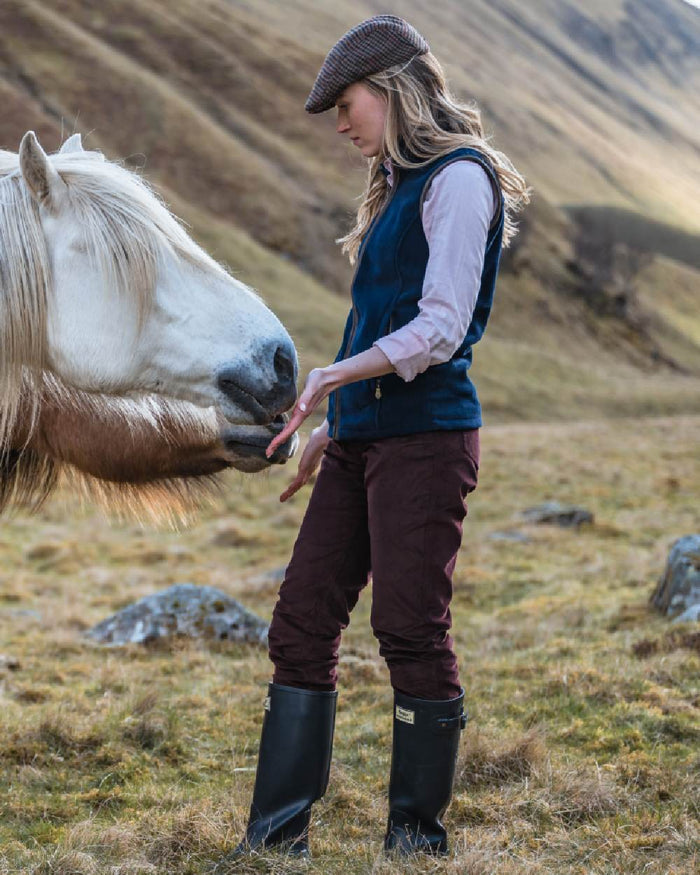 Merlot Coloured Hoggs of Fife Ceres Ladies Stretch Cord Jeans on outdoor background #colour_merlot