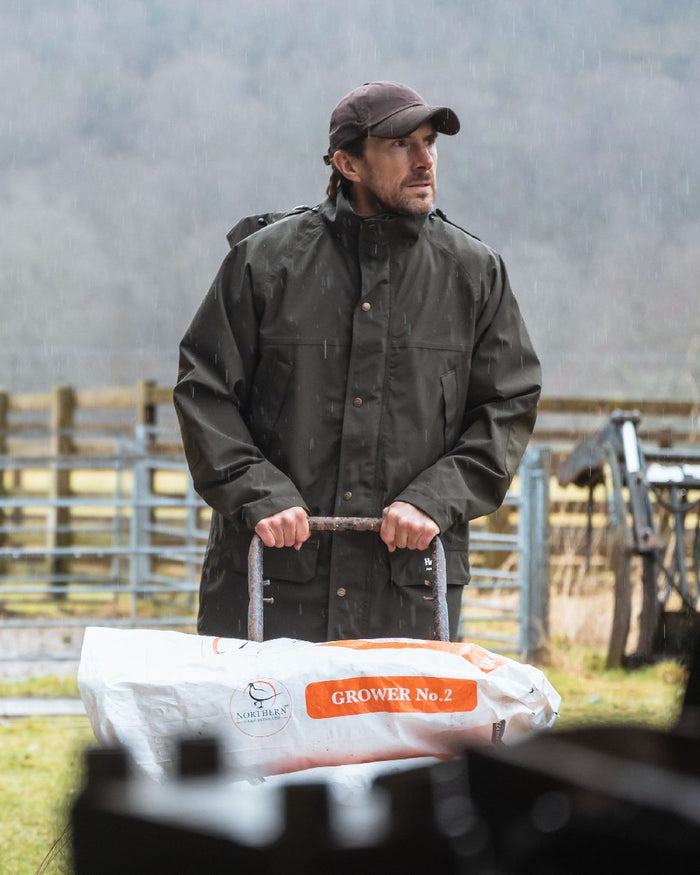Brown Coloured Hoggs of Fife Leather Peak Waxed Baseball Cap on  countryside background #colour_brown