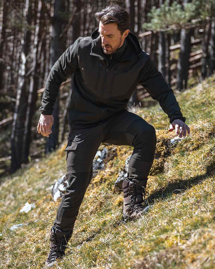 Green Coloured Hoggs of Fife Mens Ardross 4 Way Active Jacket on forest background #colour_green
