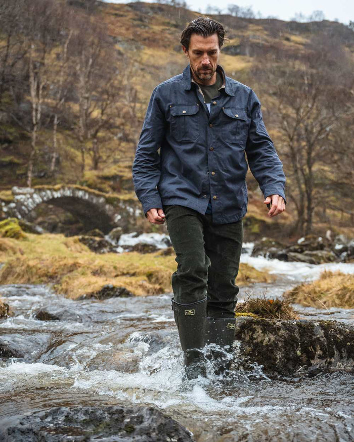 Midnight Navy Coloured Hoggs of Fife Mens Huntly Waxed Canvas Utility Overshirt on mountain background #colour_midnight-navy