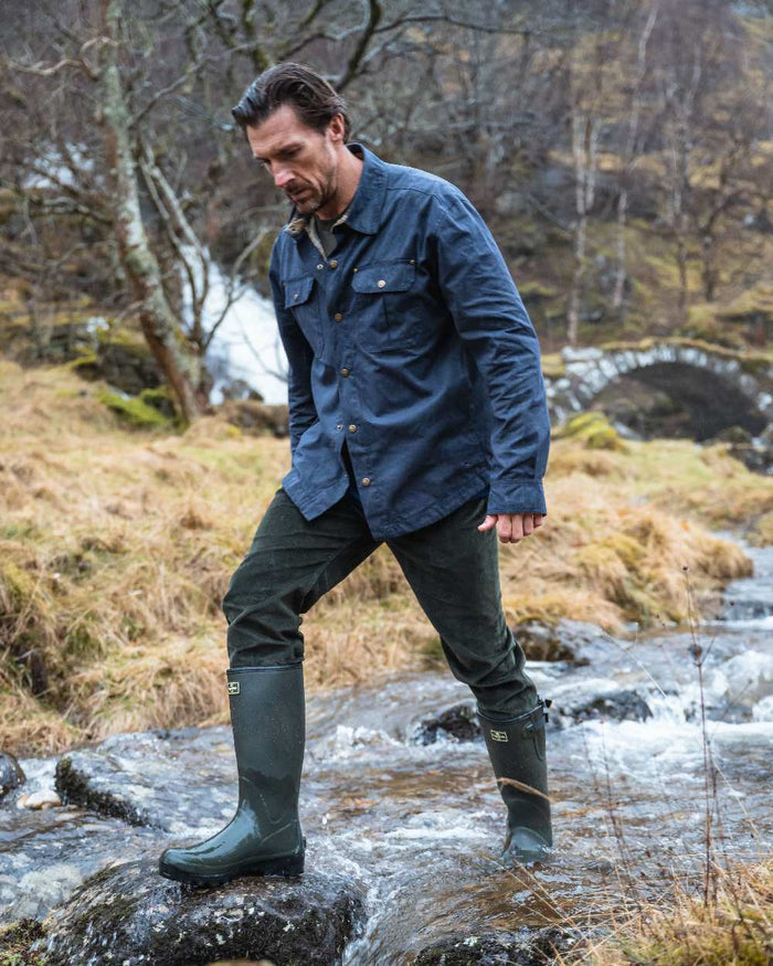 Midnight Navy Coloured Hoggs of Fife Mens Huntly Waxed Canvas Utility Overshirt on mountain background #colour_midnight-navy