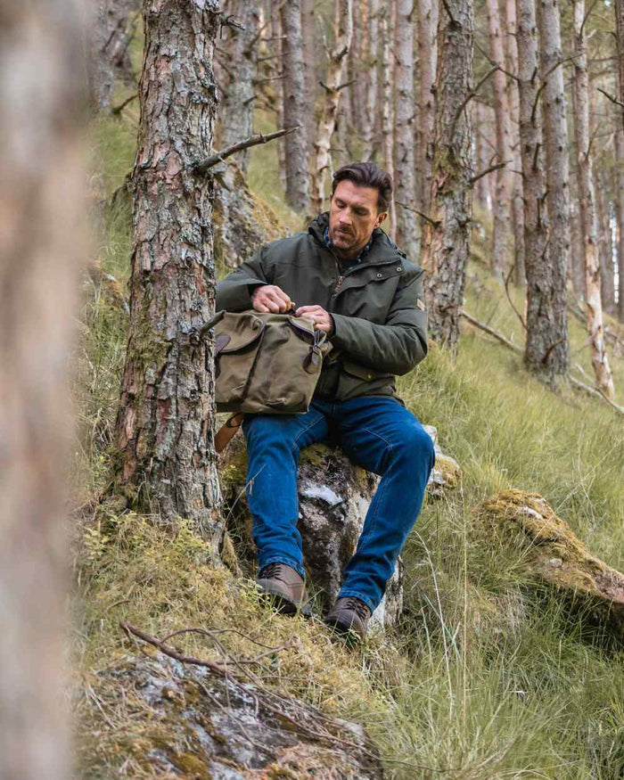 Forest Green Coloured Hoggs of Fife Mens Kelso Waterproof Wax Jacket on outdoor background #colour_forest-green