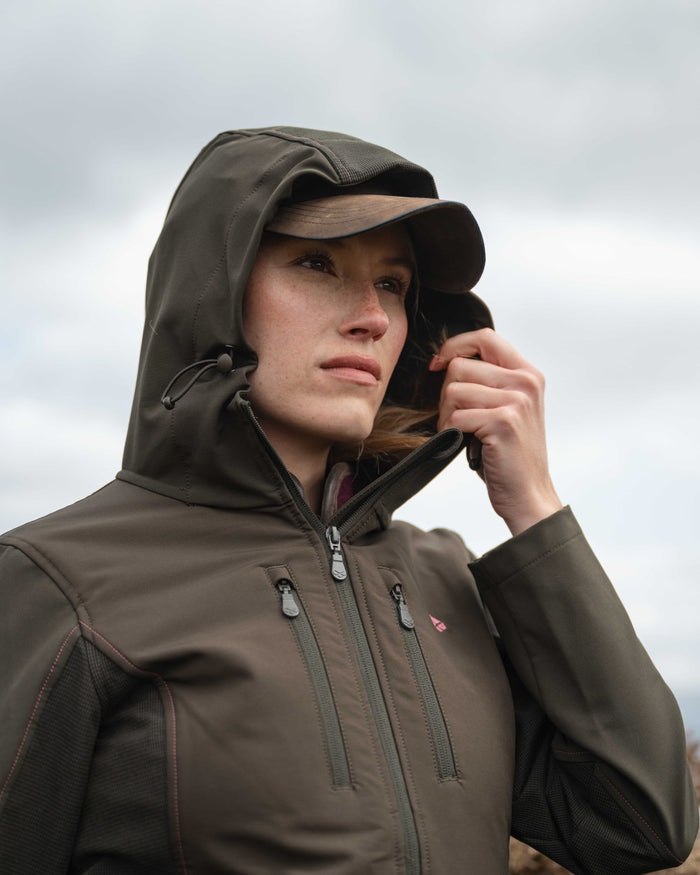 Green Coloured Hoggs of Fife Womens Ardross 4-Way Active Jacket on mountain background #colour_green