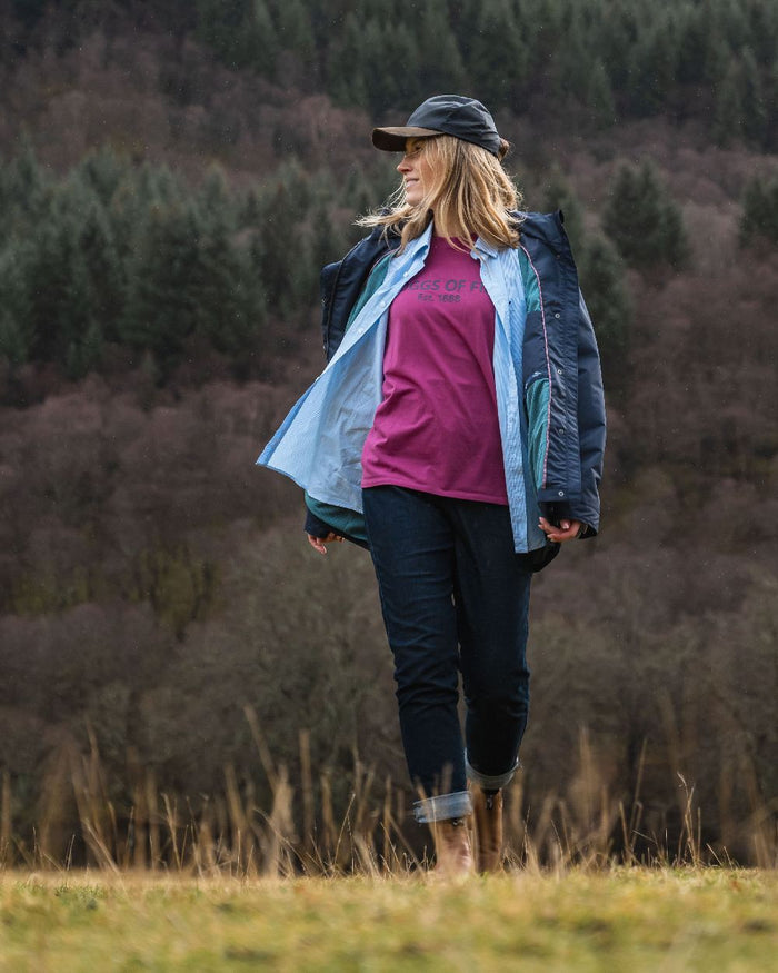 Navy Coloured Hoggs of Fife Womens Fara Waterproof Jacket on forest background #colour_navy