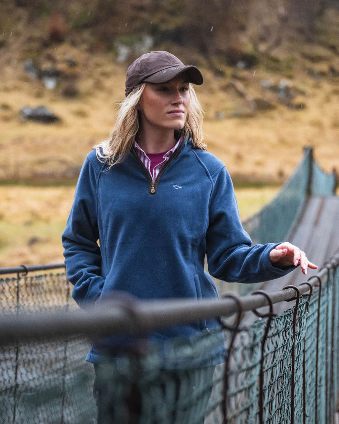 Nordic Blue Coloured Hoggs of Fife Womens Stenton Quarter Zip Fleece on blurry background #colour_nordic-blue