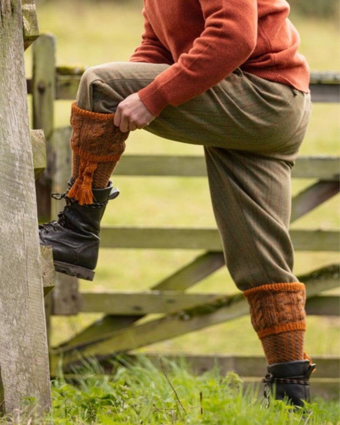 Honeysuckle coloured House of Cheviot Reiver Socks on field background #colour_honeysuckle