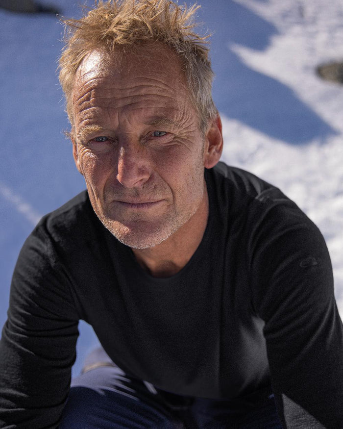 Black Coloured Icebreaker Mens Merino 200 Oasis Crewe Thermal Top on sky background #colour_black