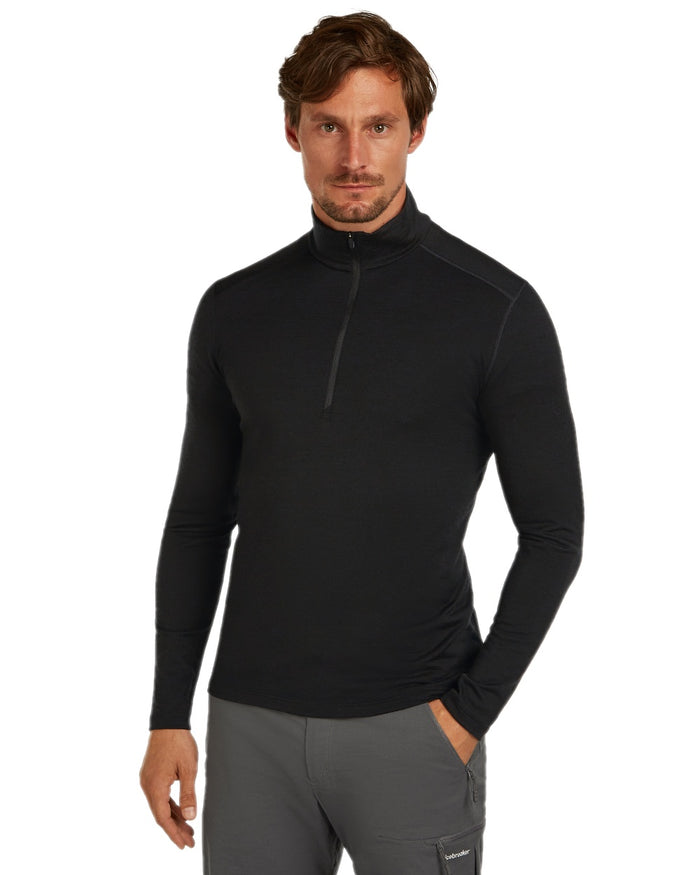 Black Coloured Icebreaker Mens Merino 200 Oasis Half Zip Thermal Top on white background #colour_black