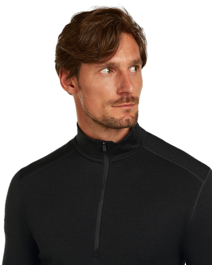 Black Coloured Icebreaker Mens Merino 200 Oasis Half Zip Thermal Top on white background #colour_black