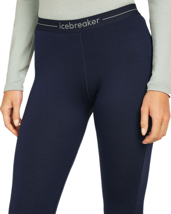Midnight Navy Coloured Icebreaker Merino Womens 260 Tech Thermal Leggings on white background #colour_midnight-navy