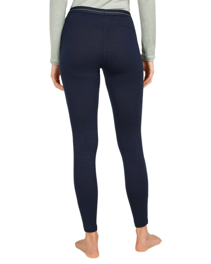 Midnight Navy Coloured Icebreaker Merino Womens 260 Tech Thermal Leggings on white background #colour_midnight-navy
