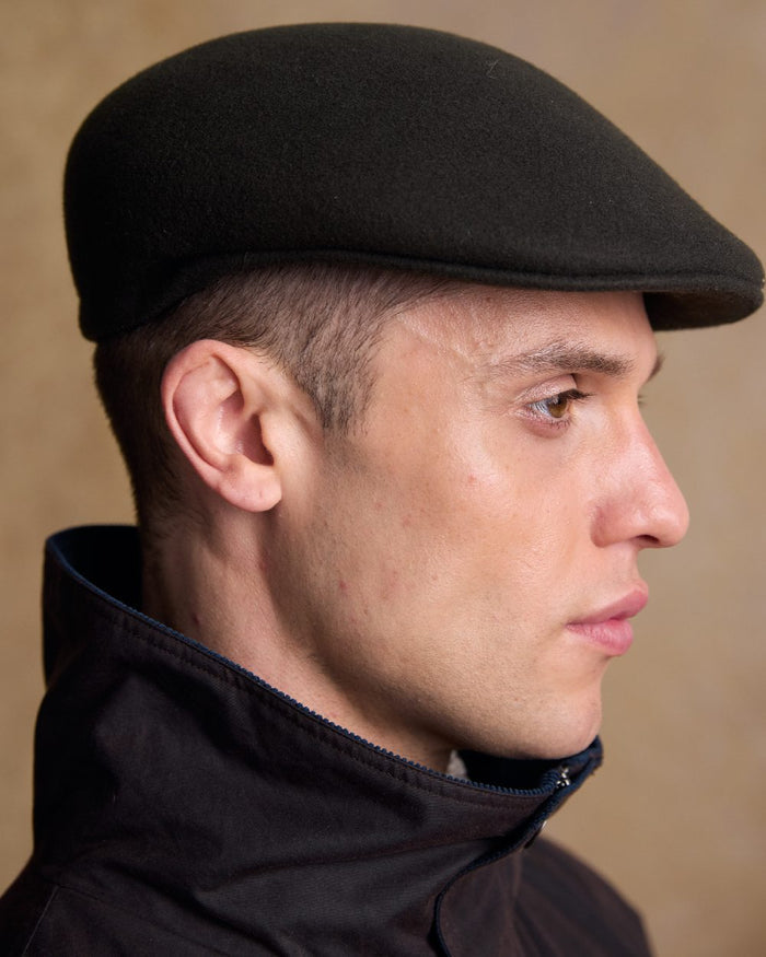Olive Coloured Jack Murphy Mens Galway Felt Flat Cap on indoor background #colour_olive
