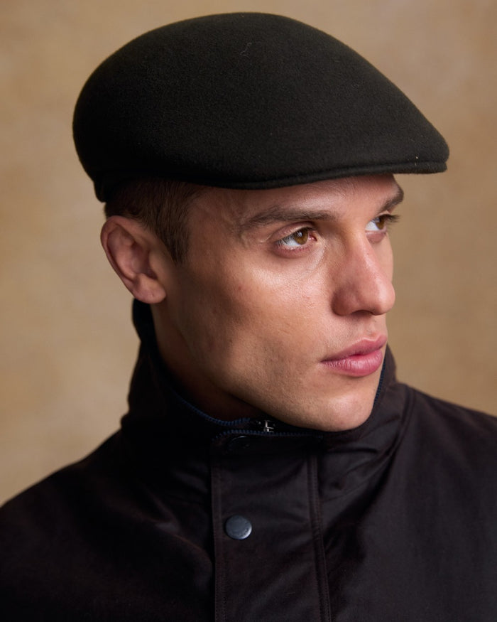Olive Coloured Jack Murphy Mens Galway Felt Flat Cap on indoor background #colour_olive