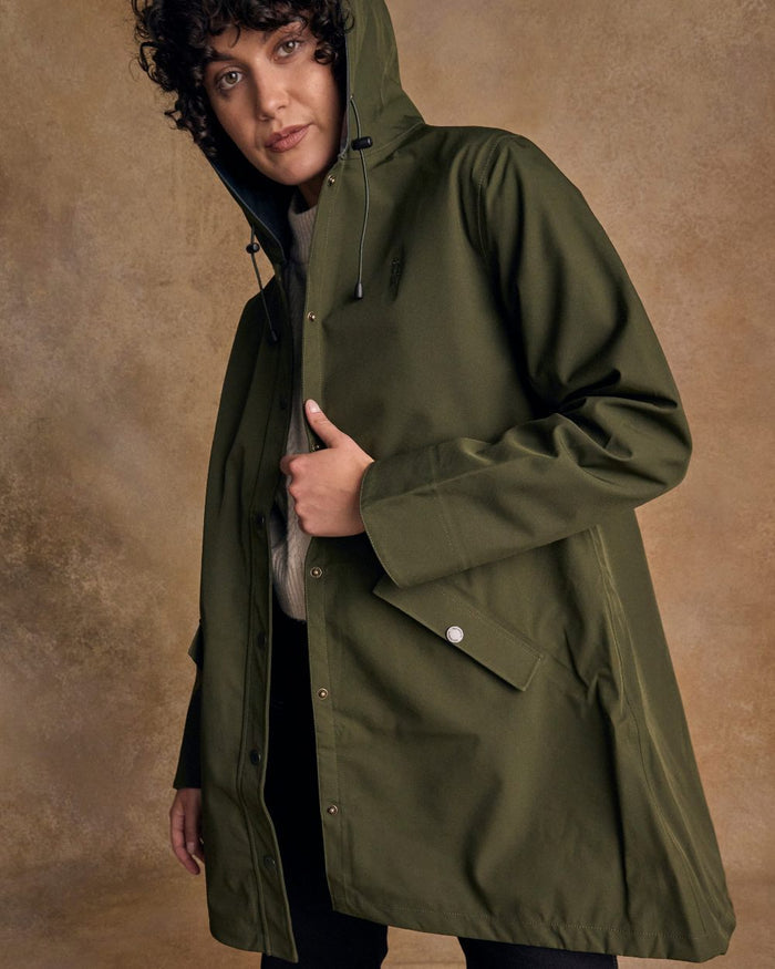 Olive Coloured Jack Murphy Womens Fiadh Waterproof Jacket on indoor background #colour_olive