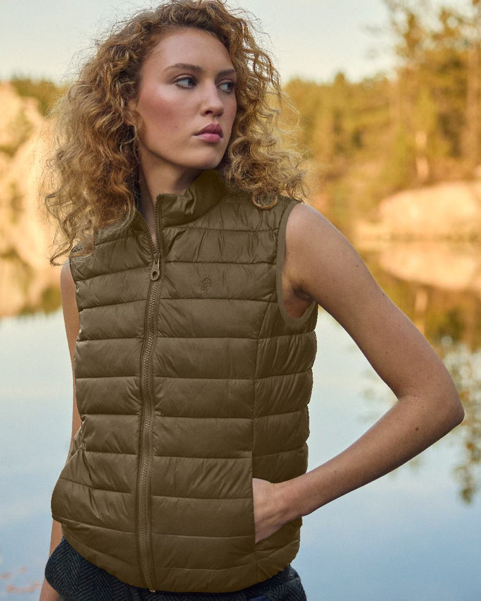 Olive Coloured Jack Murphy Womens Leah Puffa Gilet on outdoor background #colour_olive