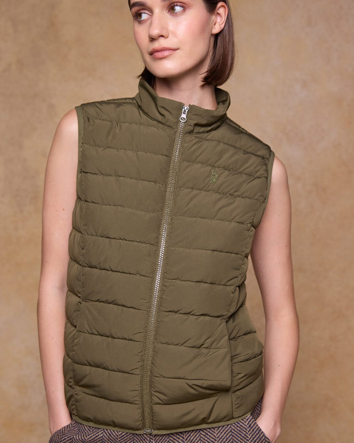 Olive Coloured Jack Murphy Womens Leah Puffa Gilet on indoor background #colour_olive