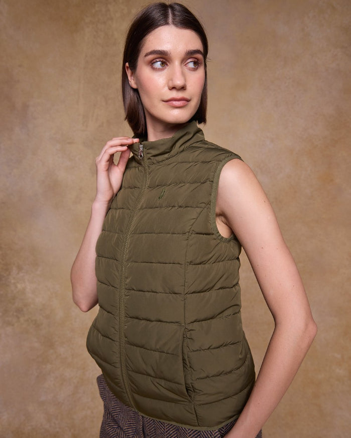 Olive Coloured Jack Murphy Womens Leah Puffa Gilet on indoor background #colour_olive
