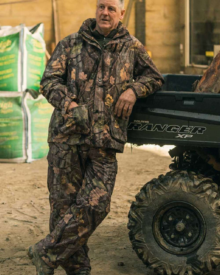 EVO coloured Jack Pyke Hunters Trousers on truck background #colour_evo