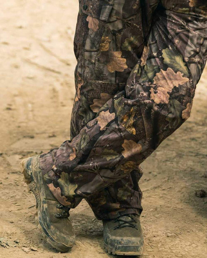 EVO coloured Jack Pyke Hunters Trousers on soil background #colour_evo