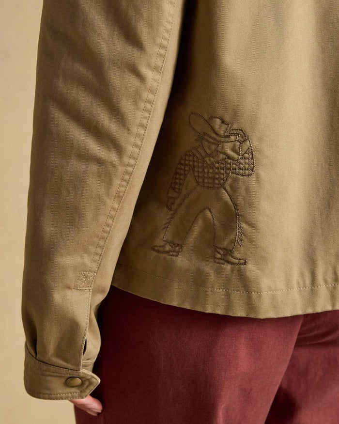 Tan Brown coloured Joules Barn Jacket on tan background #colour_tan-brown