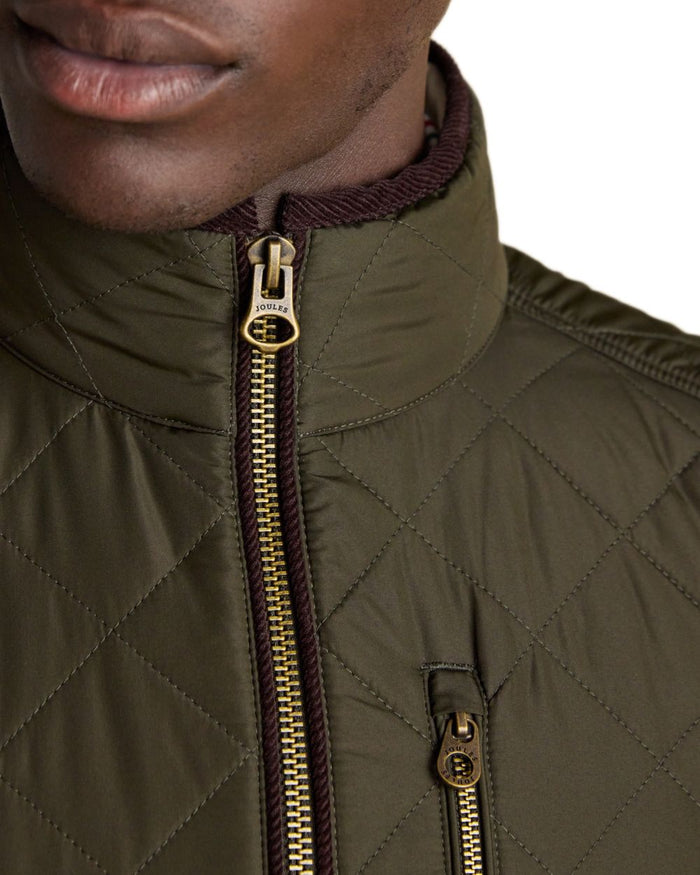 Green coloured Joules Mens Maynard Diamond Quilted Gilet on white background #colour_green